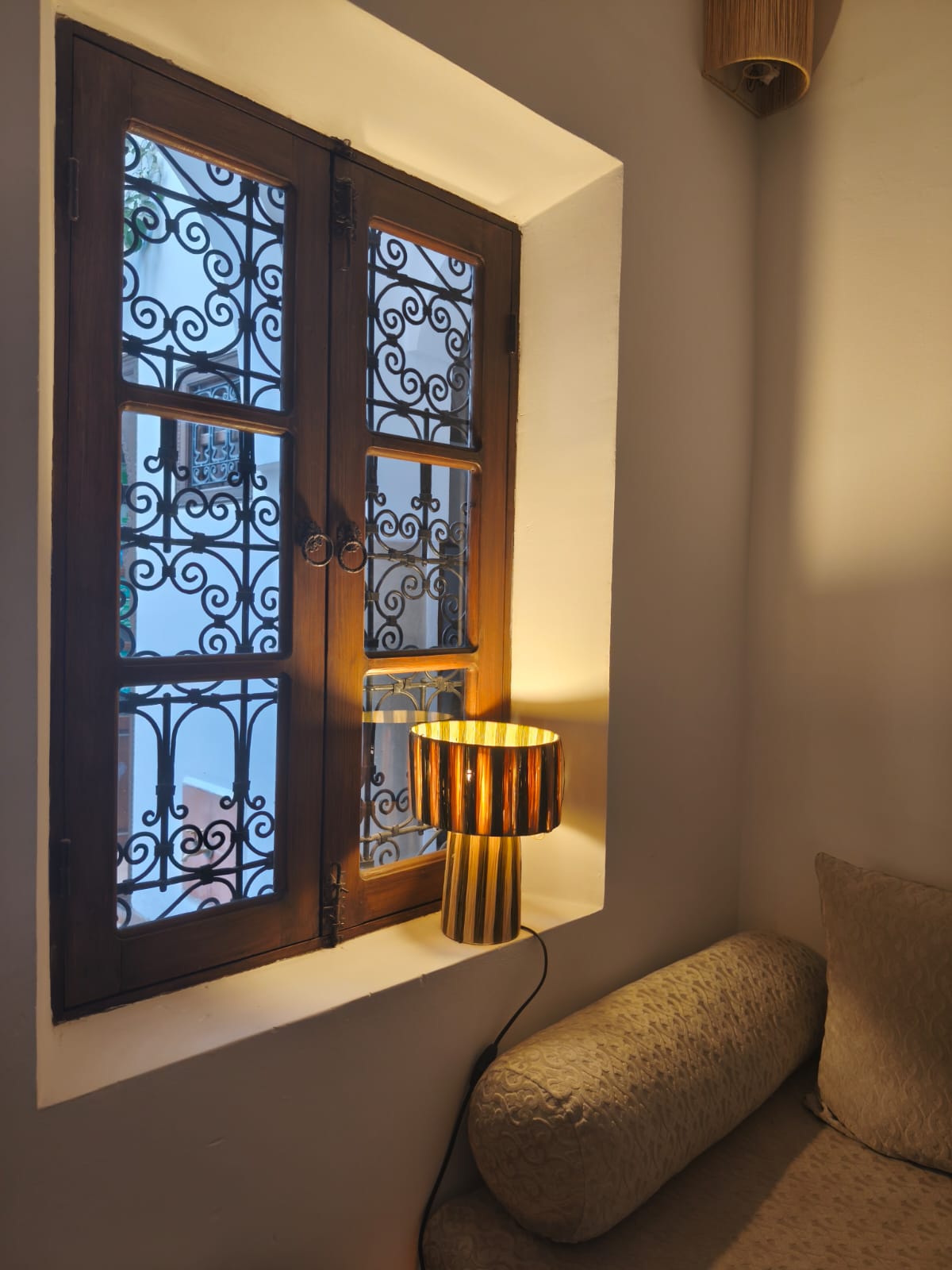 Moroccan handmade raffia lamp crafted by artisans – natural straw and black striped design