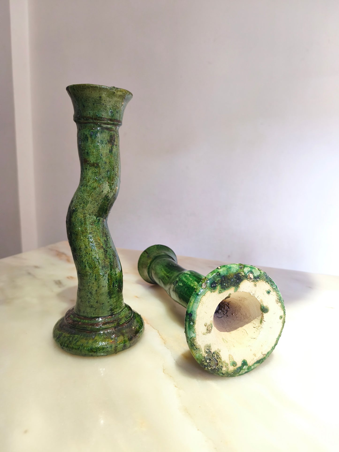 Handcrafted Moroccan pottery candle holder with green glaze and textured finish