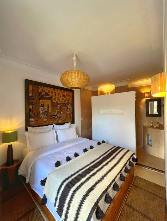 custom handmade wool blanket with brow pom poms handmade in Morocco for king size bed with brow wool strap 