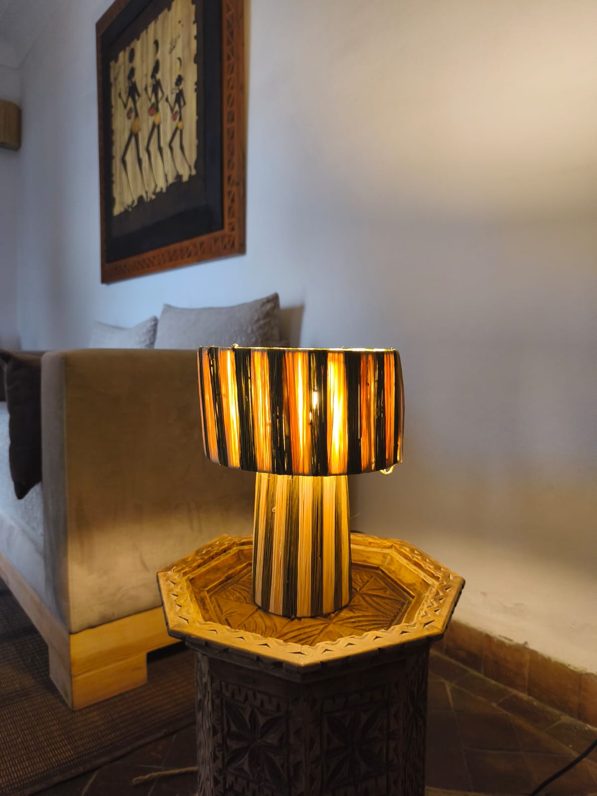 Handwoven raffia lamp from Morocco with black and beige stripes – artisan home lighting