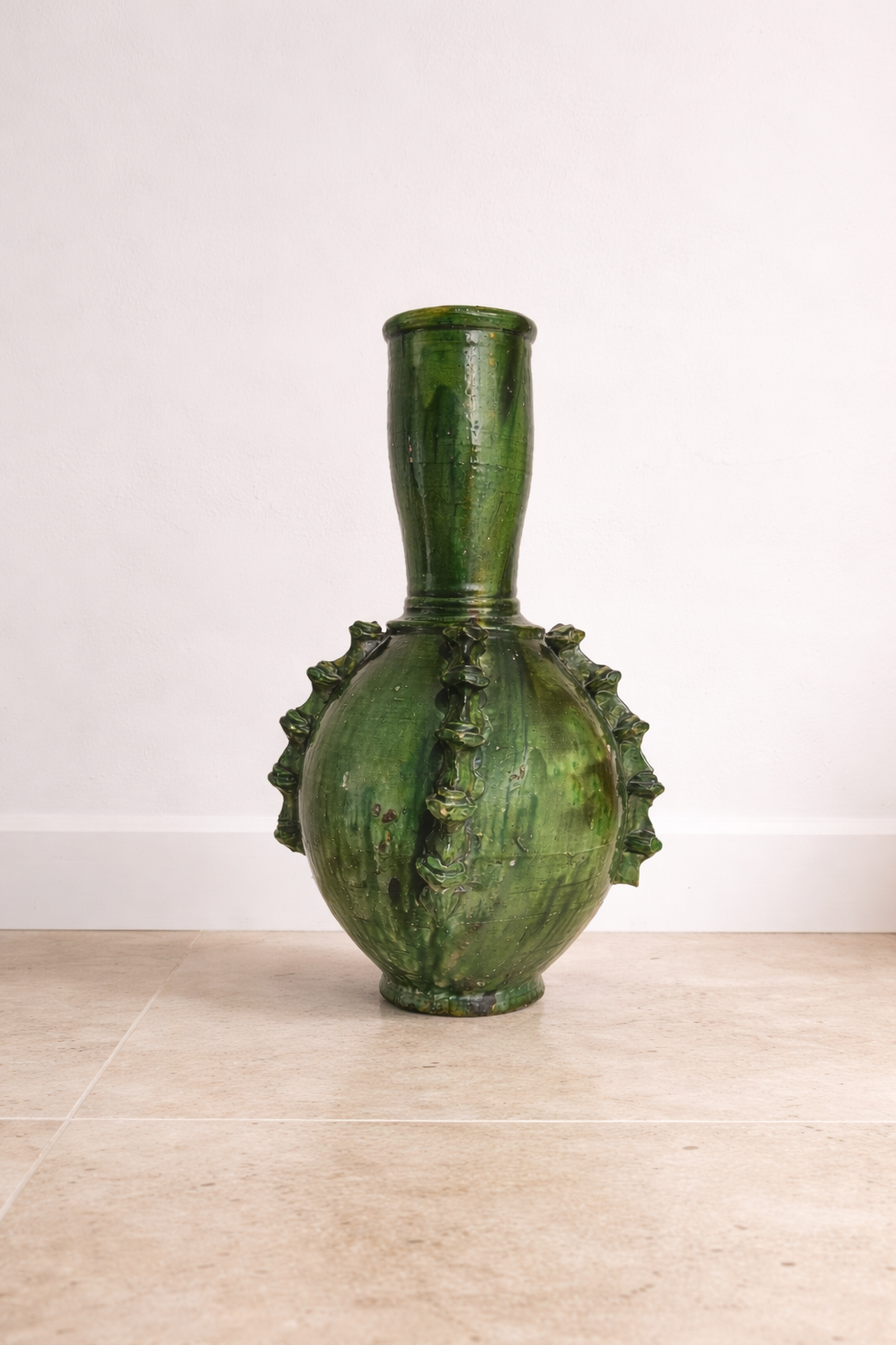 Authentic Moroccan Tamegroute pottery green ceramic vase with traditional glaze and handmade texture