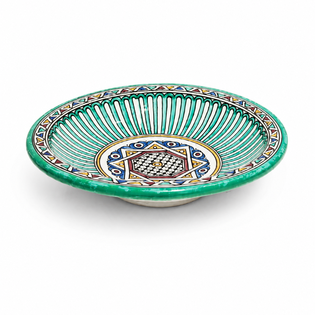 Decorative ceramic bowl with green rim and colorful geometric pattern on a white background