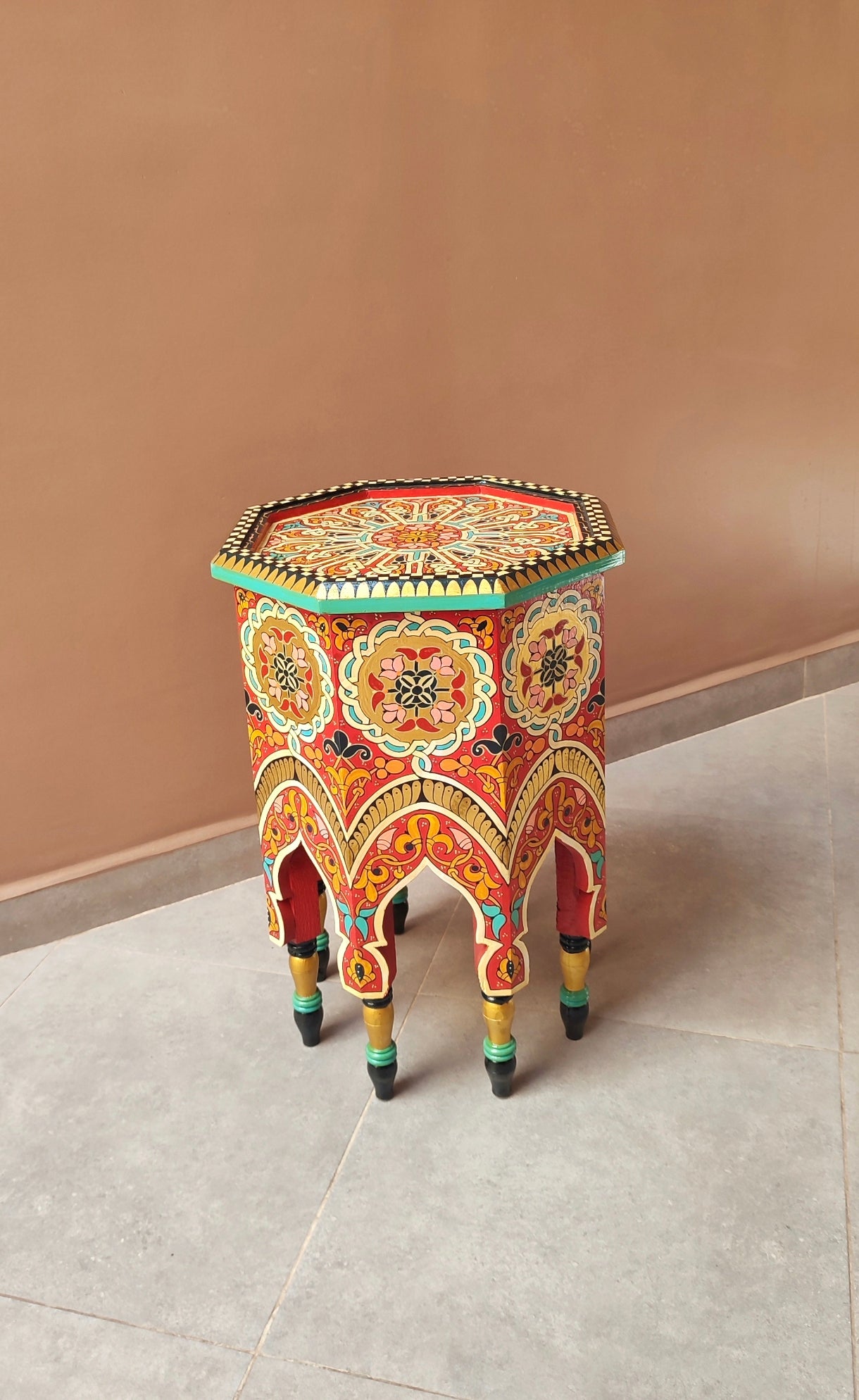 Moroccan wooden table with bold Moorish patterns 
